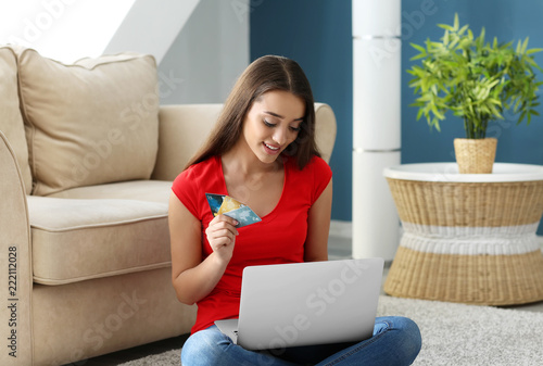 Young woman shopping online...
