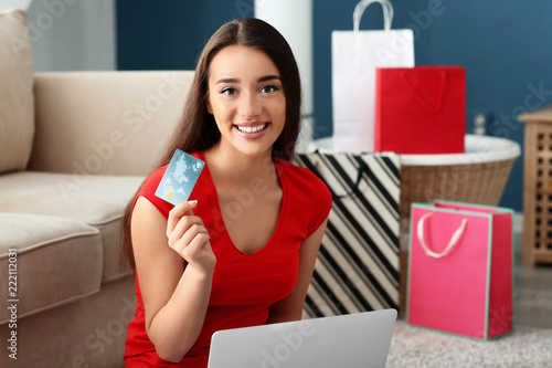 Young woman shopping online...