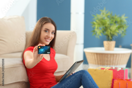 Young woman shopping online...