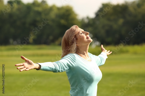 Beautiful mature woman outd...