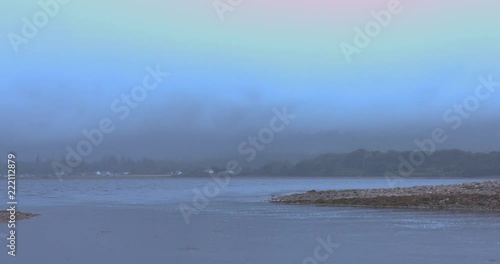 A view across Loch Linnet mist covered banks. photo