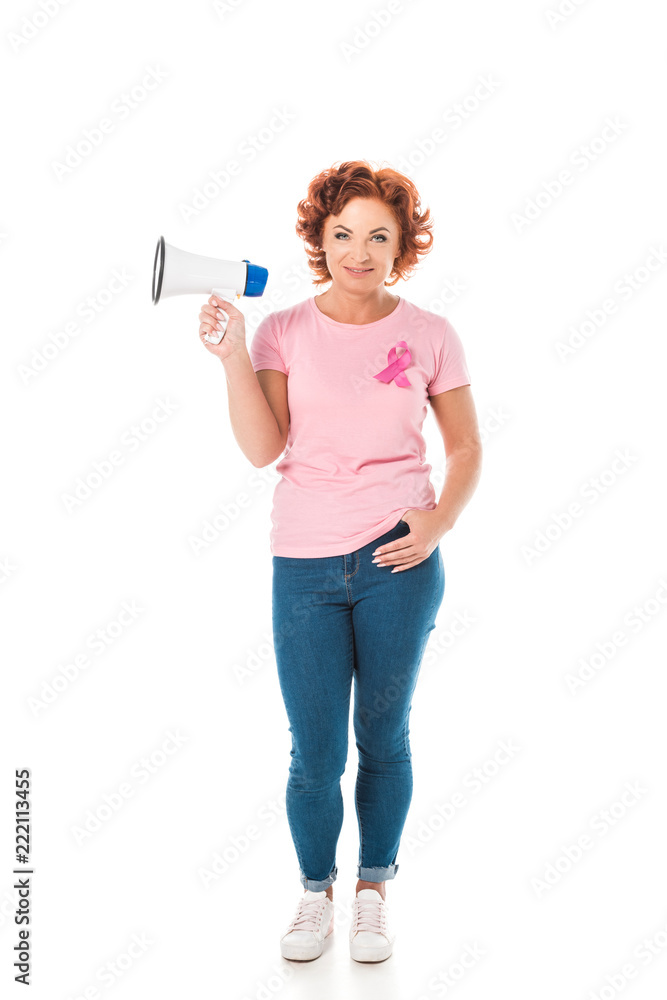 woman in pink t-shirt with breast cancer awareness ribbon holding megaphone and smiling at camera isolated on white woman in pink t-shirt with breast cancer awareness ribbon holding megaphone and smiling at camera isolated on white