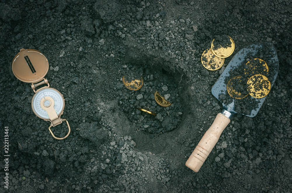 Coins, shovel and compass. Coins searching. Treasure hunting concept. In search of a lost treasure. - obrazy, fototapety, plakaty 