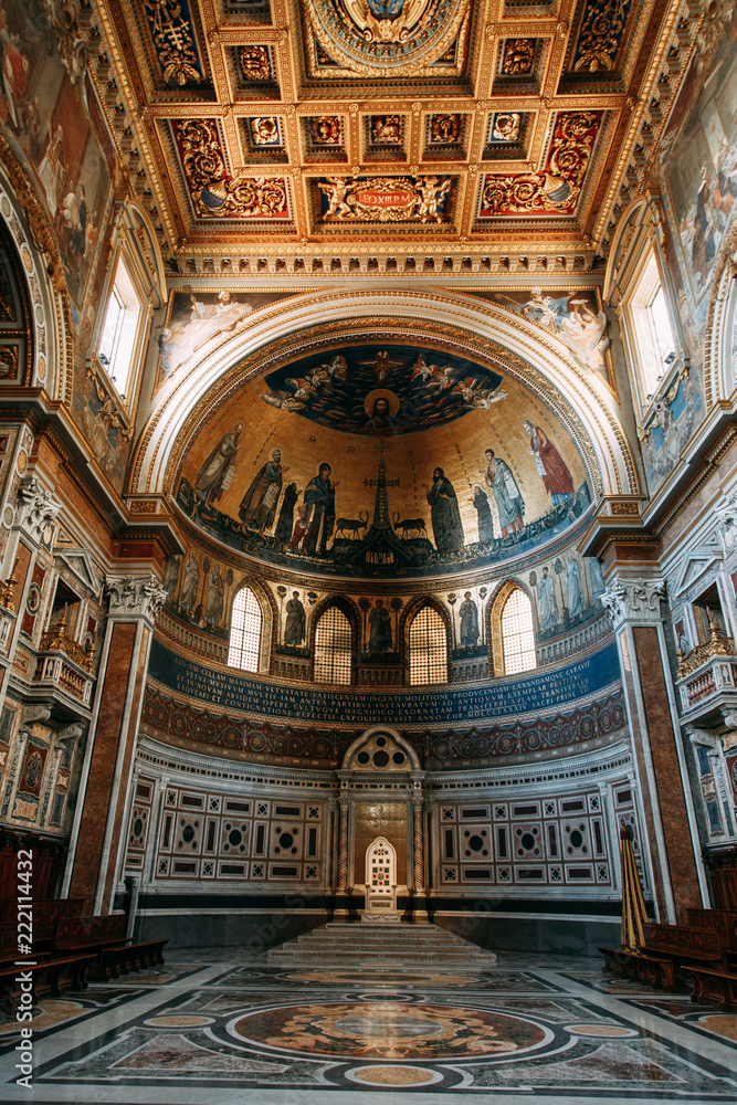 Obraz premium Salvatore Church in Rome, view from outside and inside. Frescoes and statues, architectural elements. A historic landmark, tourist destination. Ancient painting