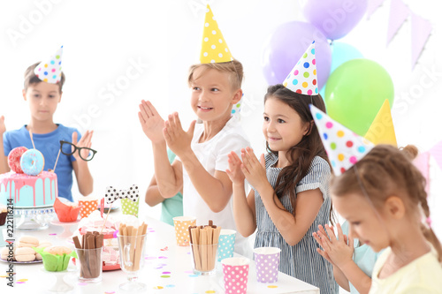 Cute little children celebr...
