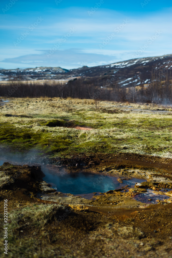 Steam Rises Off a Hot Spring in the Geysir Geothermal Field in Iceland