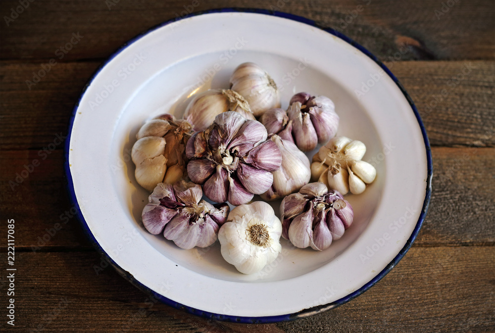 Garlic in the kitchen on wood Garlic in the kitchen on wood