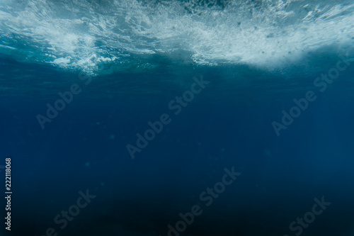 mysterious underwater ocean. with air bubbles.