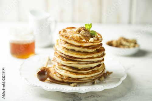Pancakes with honey and nuts