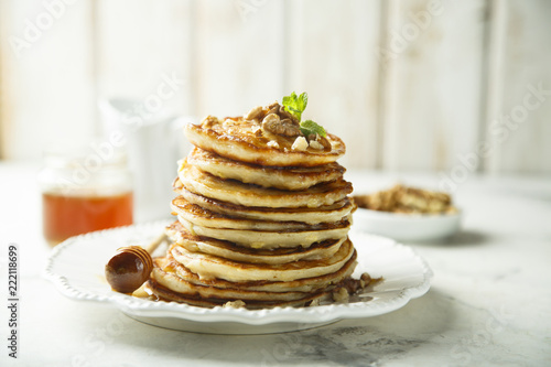 Pancakes with honey and nuts