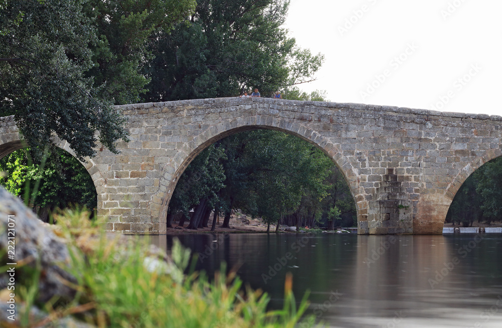 Ancient stone bridge over river