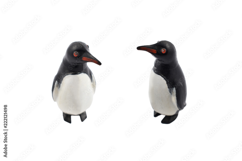 Obraz premium Vintage penguin toy stock photo images. Couple of penguins isolated on a white background. Penguin figurine retro toy stock photo images