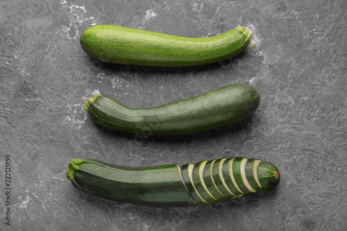 Ripe zucchinis on grunge table