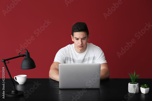 Young freelancer working on...