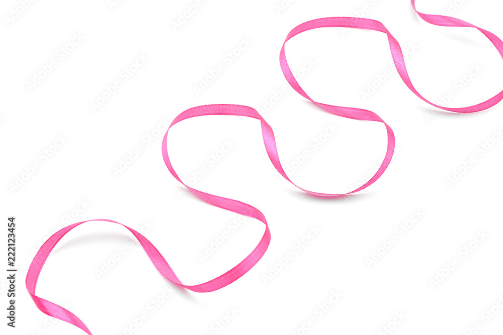 Fototapeta premium Curled pink ribbon on white background