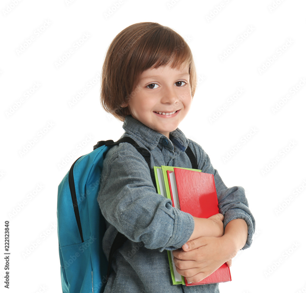 Cute little boy with books on white background Cute little boy with books on white background