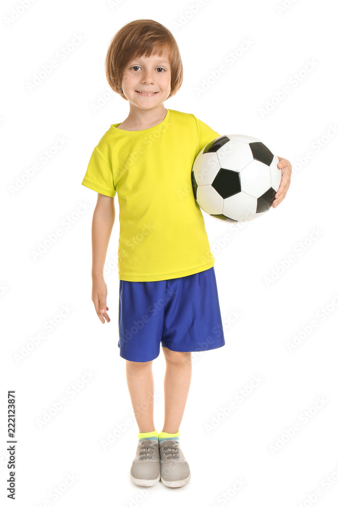 Playful little boy with soccer ball on white background