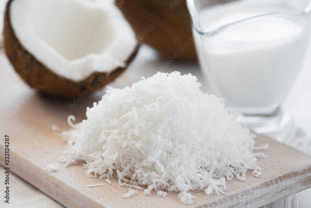 Coconut shavings on a chopping board