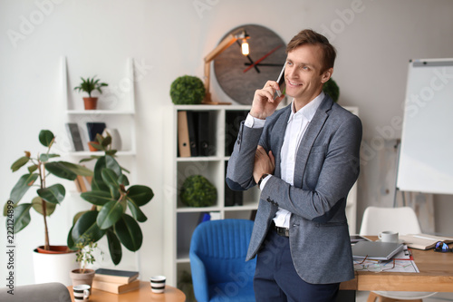 Businessman talking on phon...