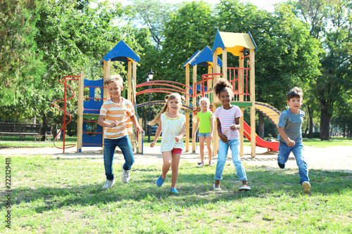 Canvas Print Cute little children playing outdoors