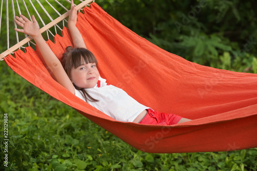 Cute little girl relaxing i...
