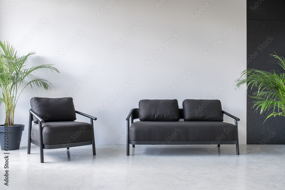 Obraz premium Stylish interior with gray and black walls