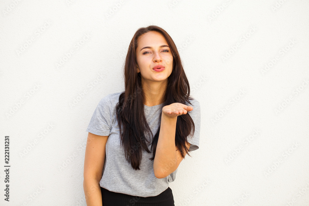 Blow kiss, young caucasian female brunette model Blow kiss, young caucasian female brunette model