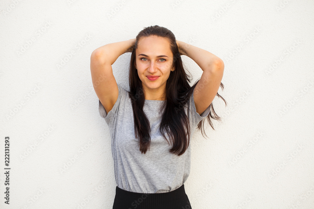 Happy brunette woman in gray t-shirt Happy brunette woman in gray t-shirt