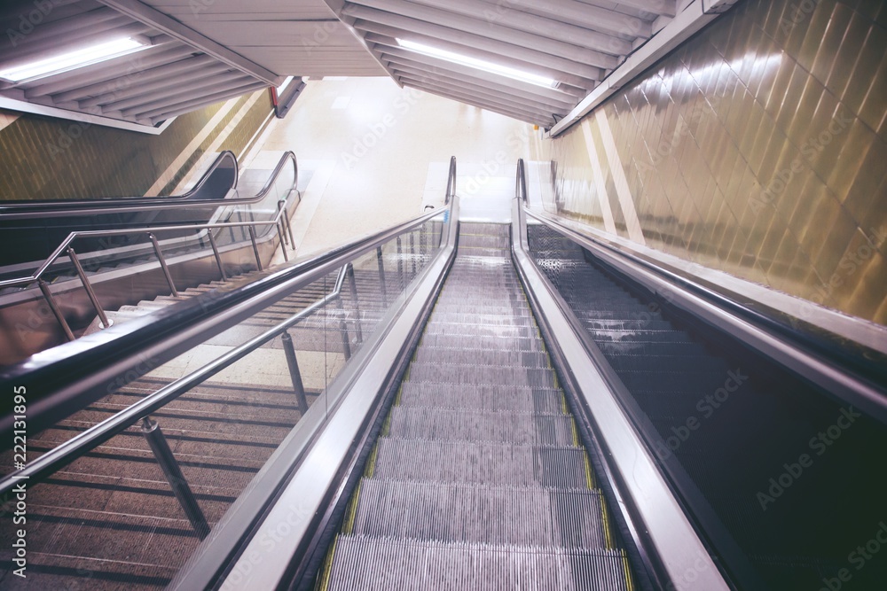 empty escalator and stair in pedestrian subway railway station. Stairs from metro underground upward. travel concept. Europe. empty escalator and stair in pedestrian subway railway station. Stairs from metro underground upward. travel concept. Europe.