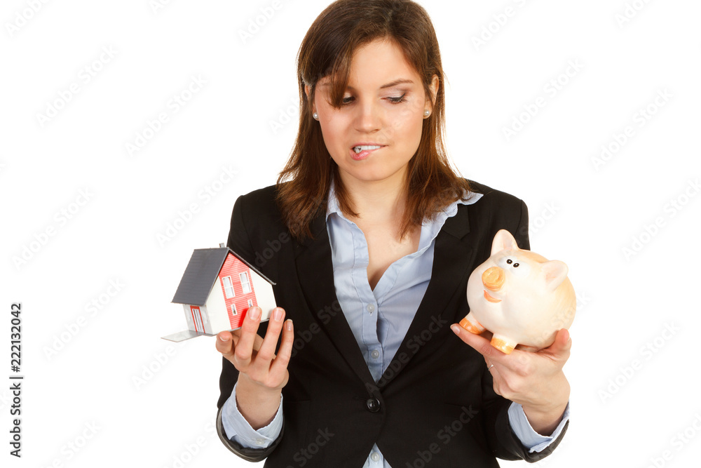 beautiful woman with piggybank and house isolated beautiful woman with piggybank and house isolated