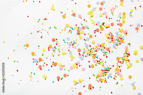 Wallpaper Mural Sugar sprinkle dots on white background. Sweet decoration for cakes. Top view Torontodigital.ca