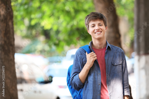 Teenage boy with backpack o...