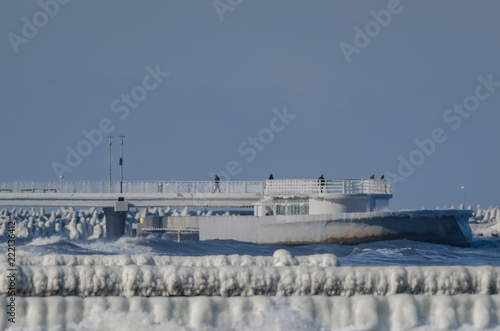 WINTER ATTACK ON THE SEA SHORE - Icy palisades and pier on the sea coast in Kolobrzeg 