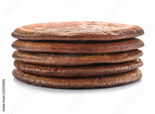 Delicious chocolate pancakes on white background photo