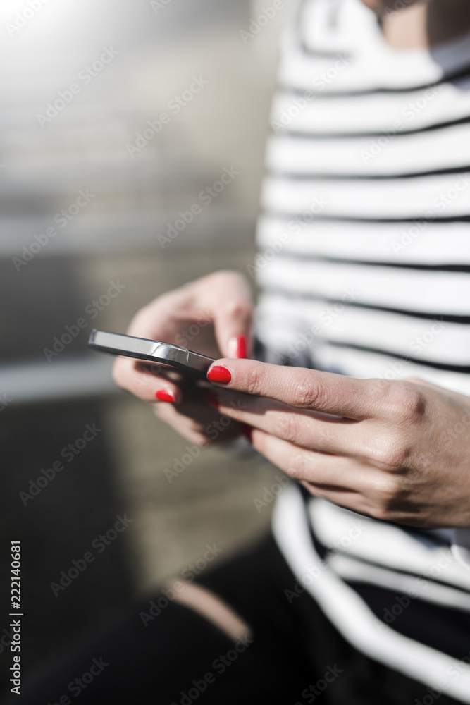 Woman's hands using cell phone, close-up Woman's hands using cell phone, close-up