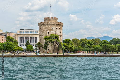 Thessaloniki, Greece - August 16, 2018: The National Theatre of Northern Greece & Aristotle's Theatre Building and White Tower in Thessaloniki.
