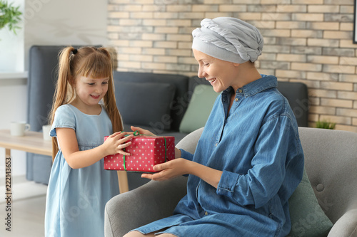 Little girl giving present ...