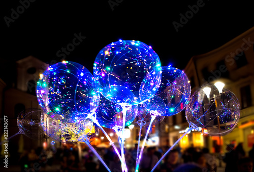 LUBLIN, POLAND - JULY 27, 2018: LED transparent balloon with multi-colored luminous garland.