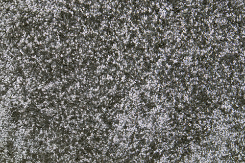 Grey synthetic short-napped floor carpet covering, may be used as background or texture