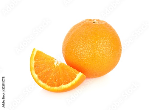 whole and cut fresh Navel orange on white background
