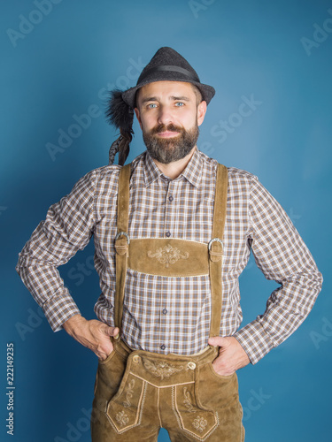 Beer Festival Oktoberfest.Man in traditional bavarian clothes Lederhose
