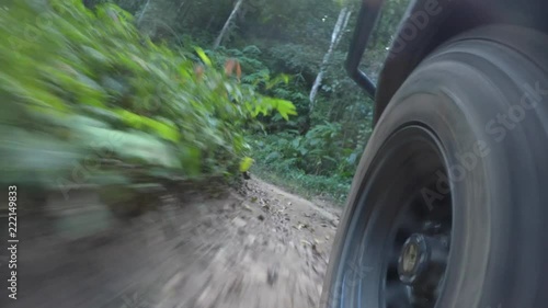 POV 4x4 front wheel driving vehicle Wilderness safari mountain forest dirt road Chiangmai Thailand