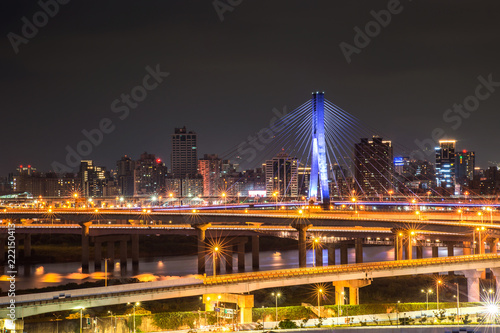 Car Light Trails of New Taipei Bridge - Busy Taipei bridge after working hours © yaophotograph