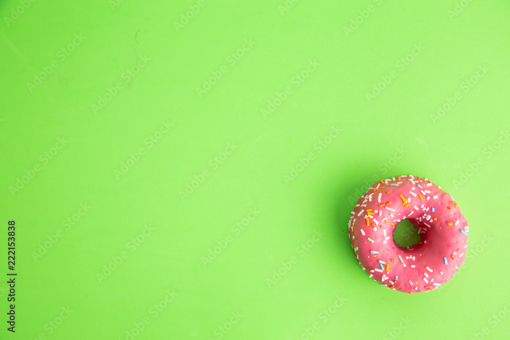 pink donut in colorful background