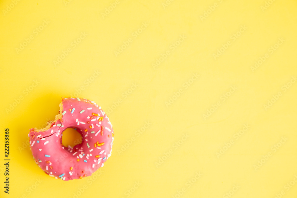 pink donut in colorful background