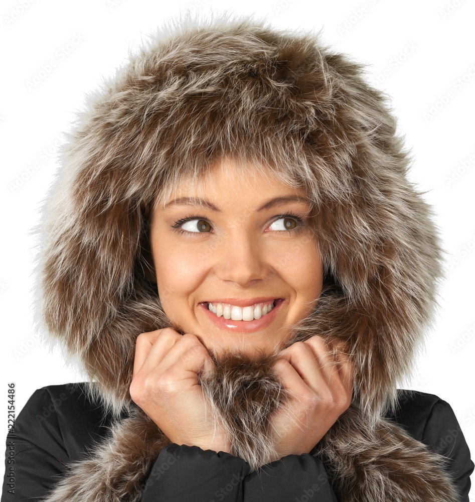 Pretty young woman in warm clothes isolated on white background Pretty young woman in warm clothes isolated on white background