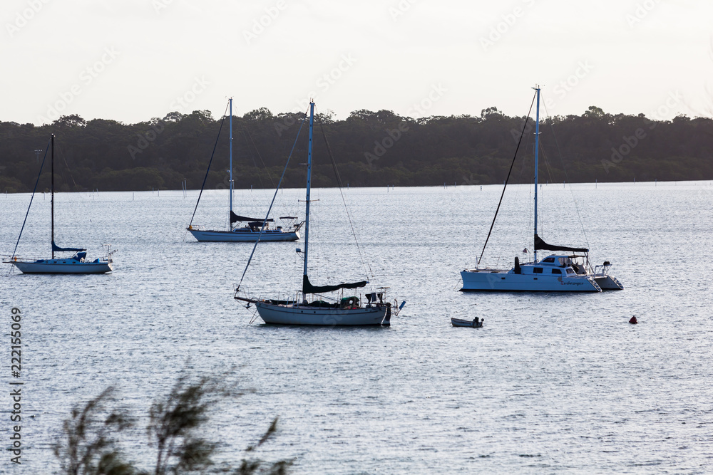 Boats moored on the water at Port Stephens, near Newcastle, Australia Boats moored on the water at Port Stephens, near Newcastle, Australia