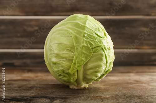 Fresh cabbage on wooden table
