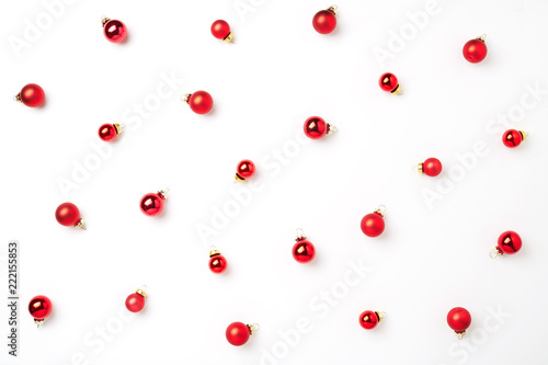 Christmas frame. Christmas pattern with red balls on a white background, Christmas decorations. A ready-made idea for your text and design
