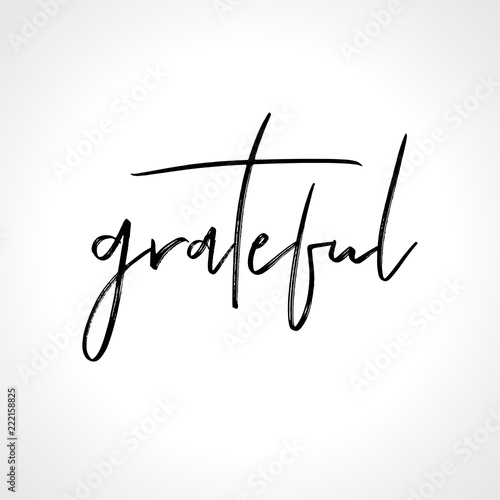 Grateful - lettering message. Hand drawn phrase. Handwritten modern brush calligraphy. Good for social media, posters, greeting cards, banners, textiles, gifts, T-shirts, mugs or other gifts. photo